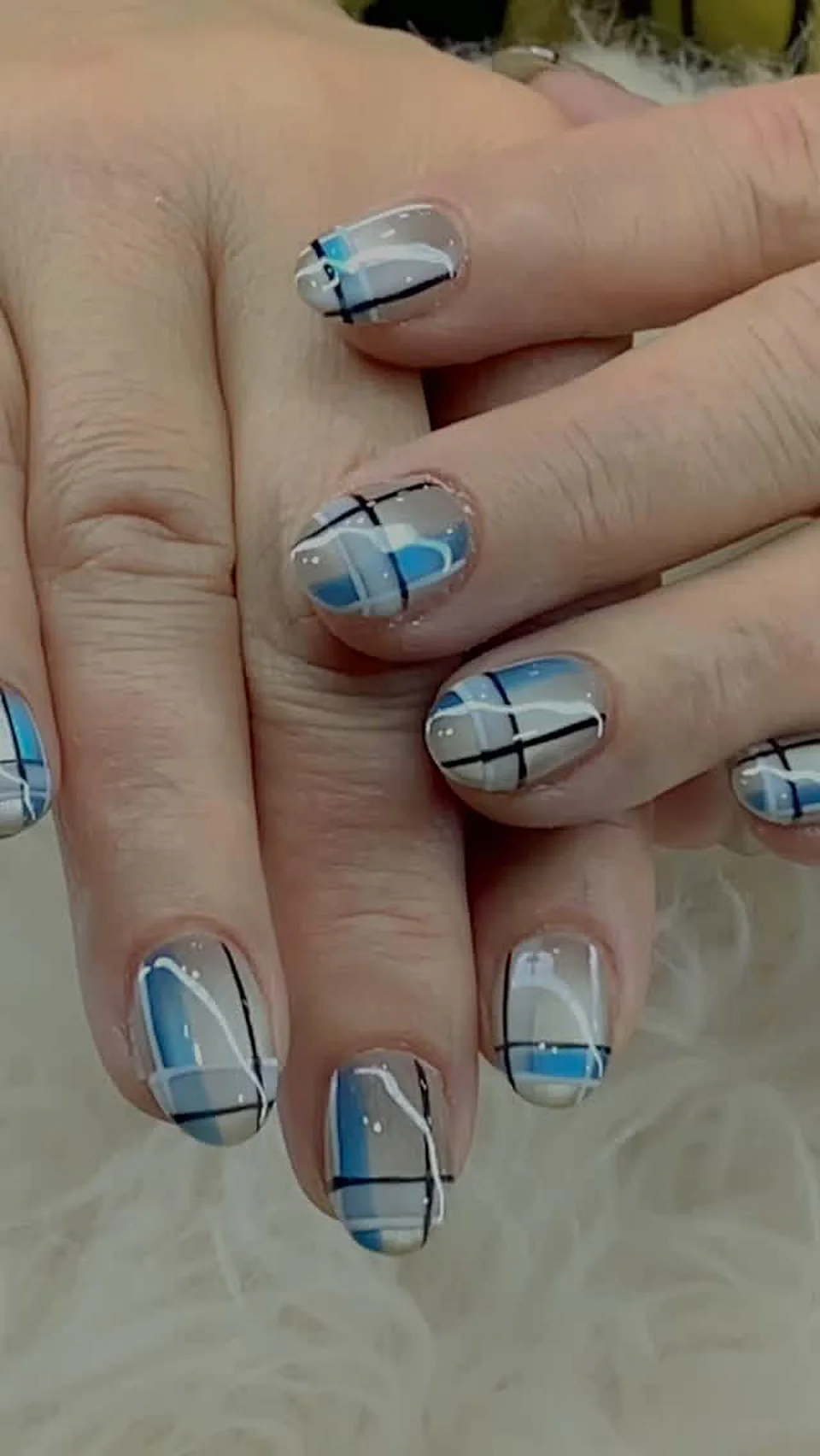 Light blue plaid and grid nail art done at Attraction Nails Salon in Roselle Park, NJ