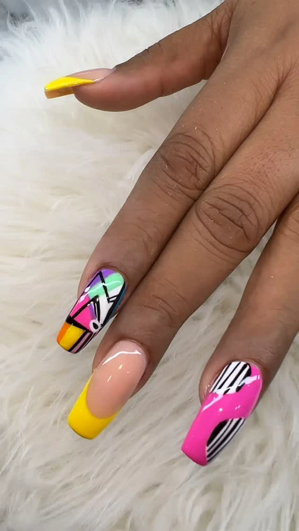 Neon abstract pop-art nail design hand-painted at Attraction Nails Salon