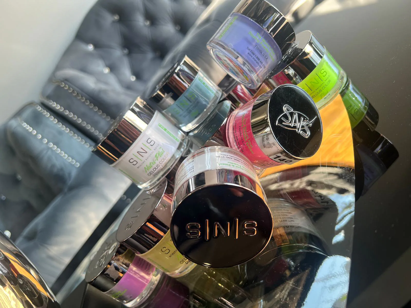 SNS Healthy Natural Nails dip powder jars used at Attraction Nails Salon