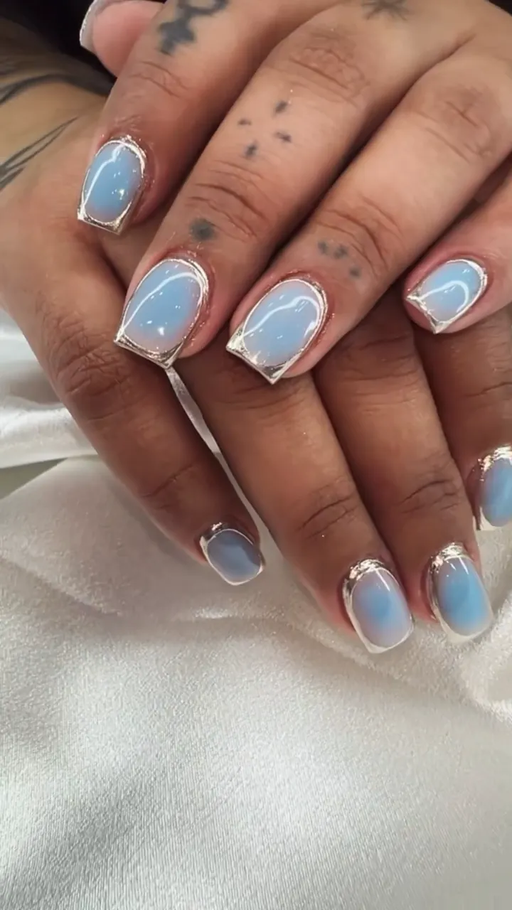 Video of light blue and silver chrome nails