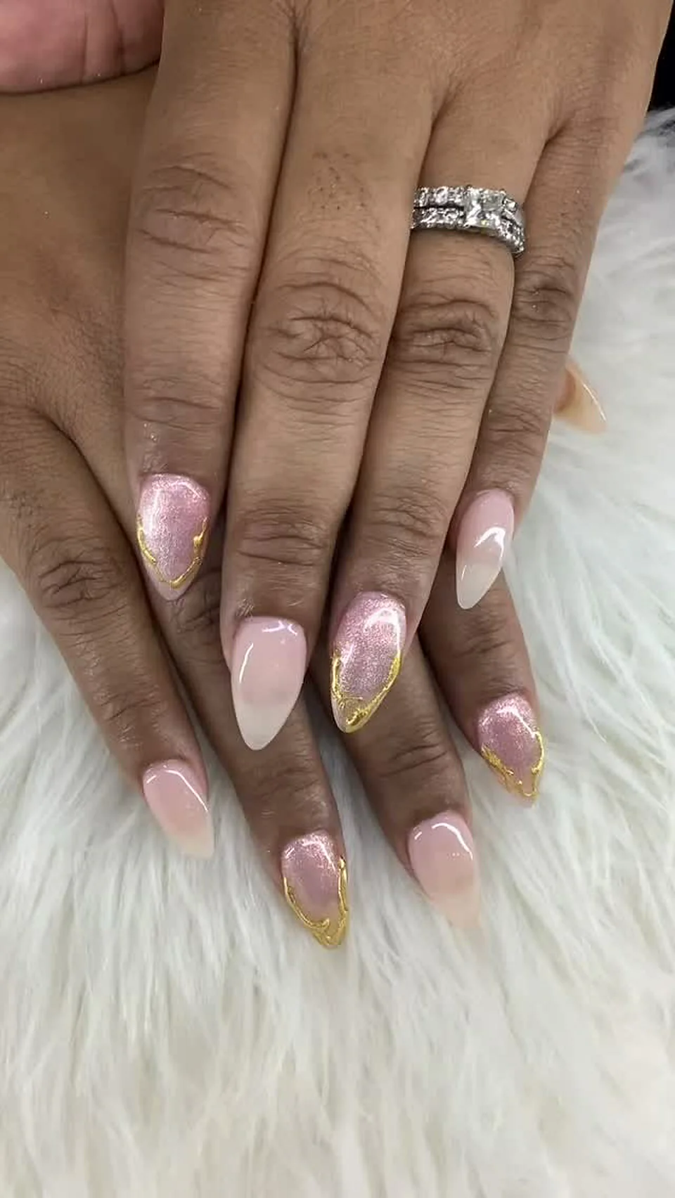 Soft pink almond nails with a thin gold French line, Attraction Nails Salon