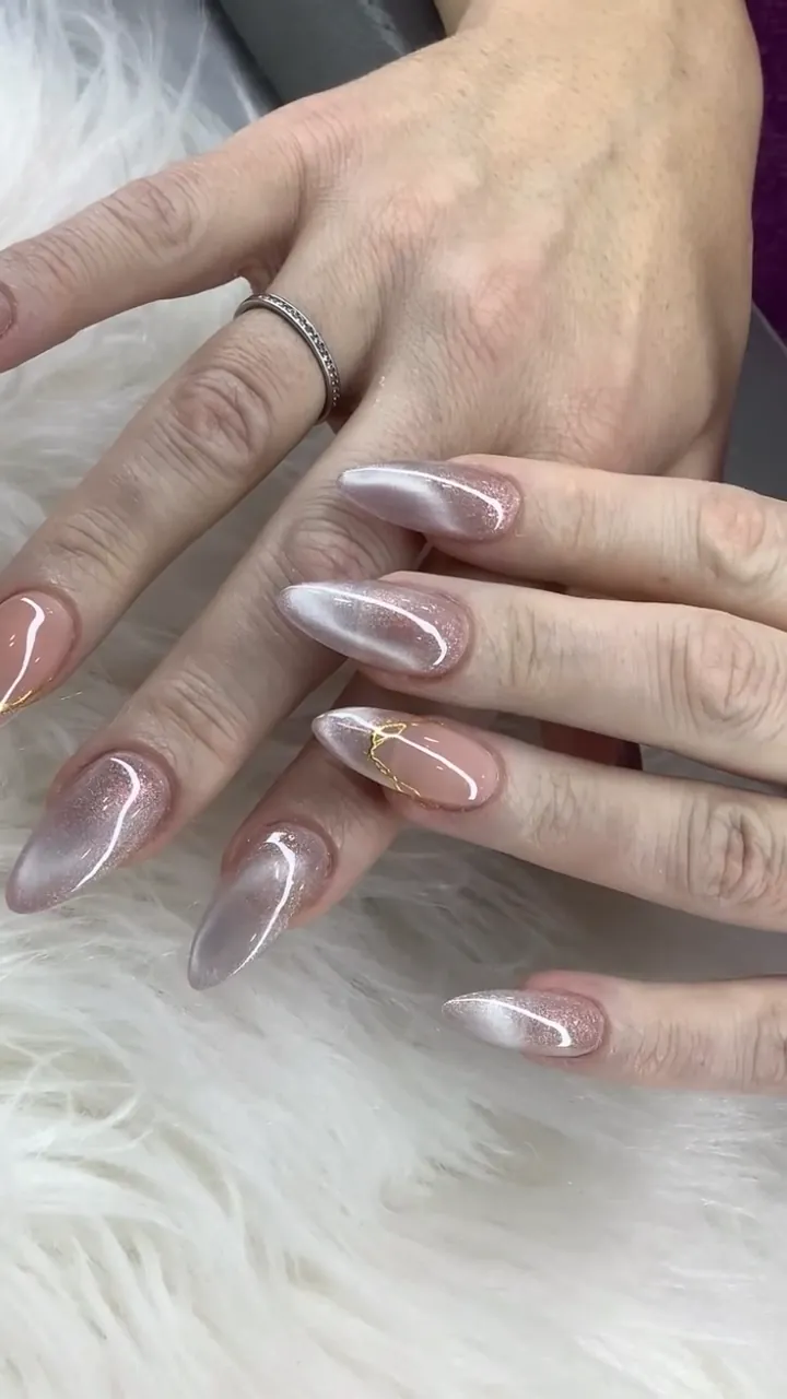 Video of nude chrome swirl nails