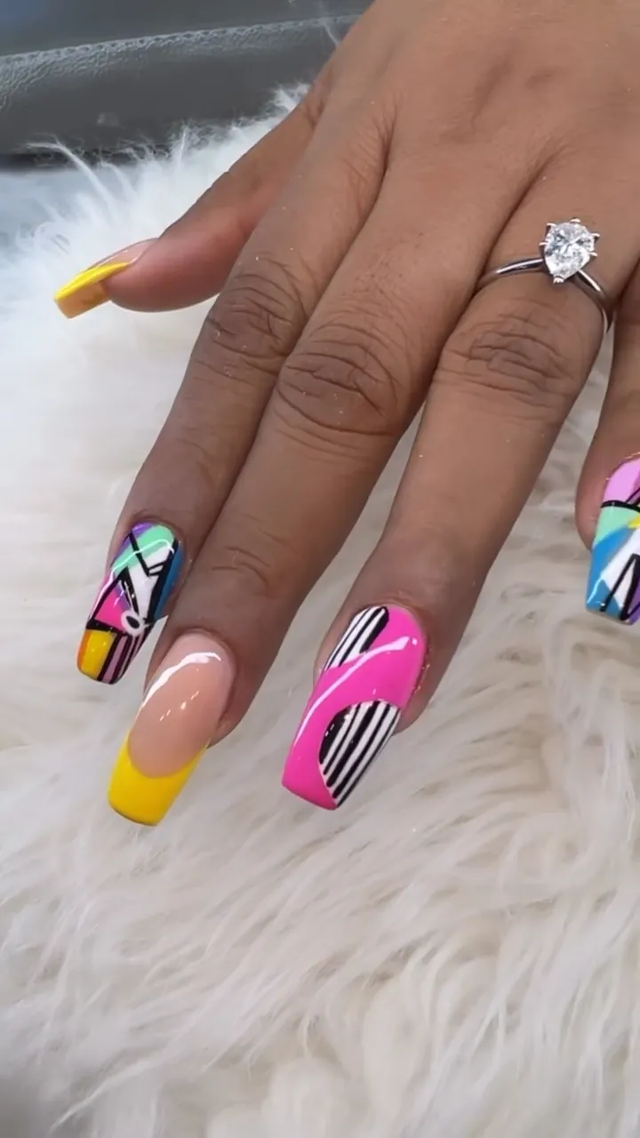 Video of neon pop-art nail design