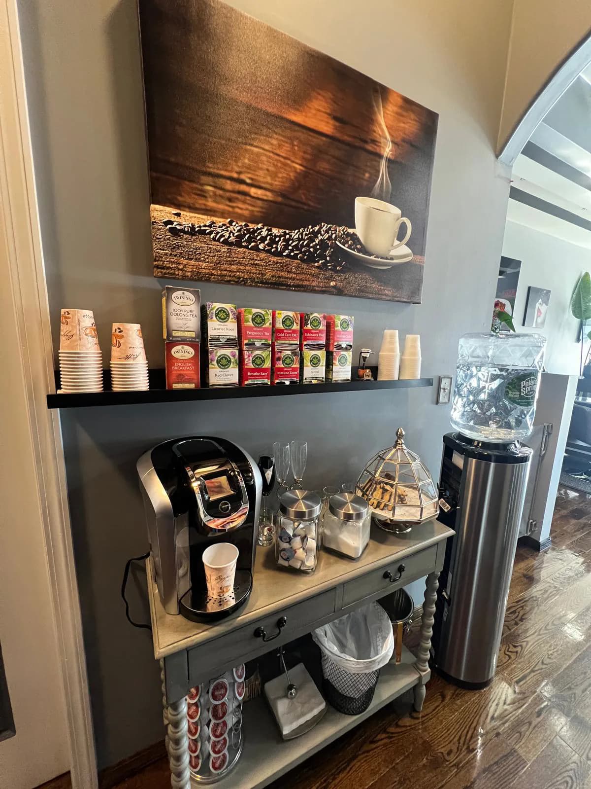 Complimentary coffee and tea bar for clients at Attraction Nails Salon