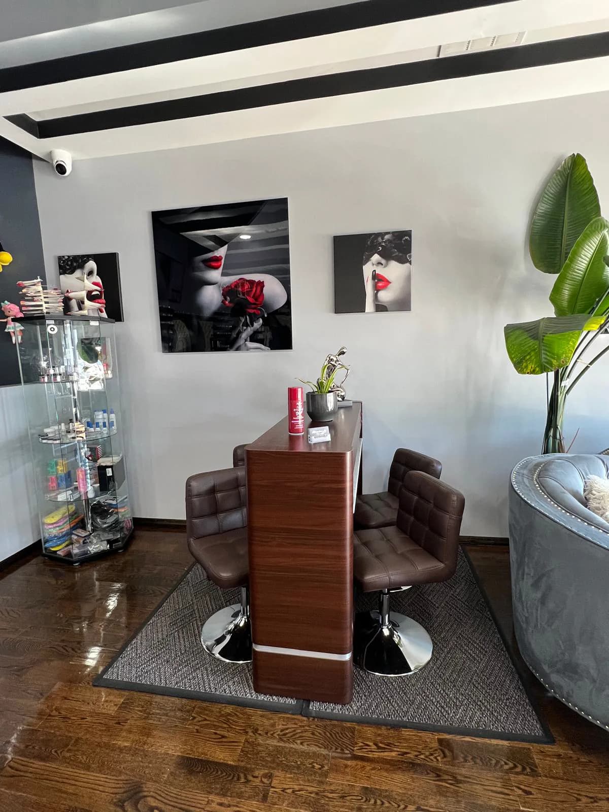 Manicure table with leather chairs at Attraction Nails Salon, Roselle Park NJ